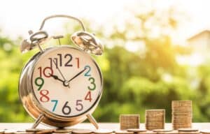 A clock on a table - Practical tips to manage your money