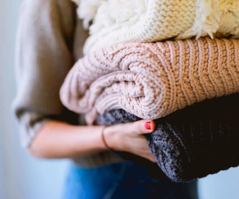 A person holding a stuffed animal