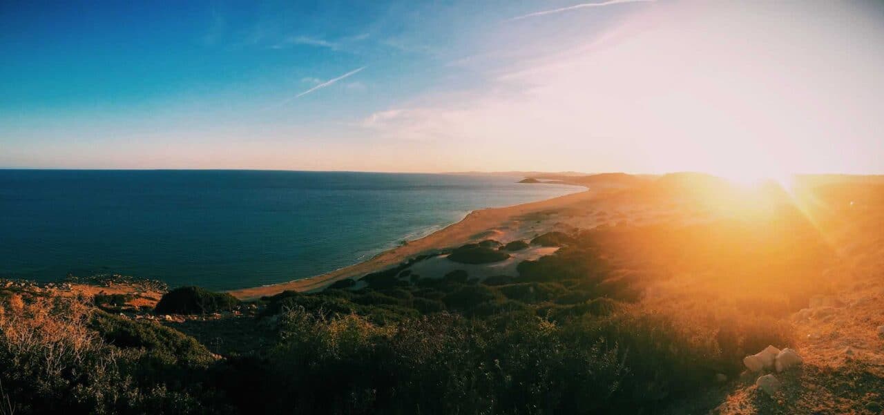 A sunset over a body of water