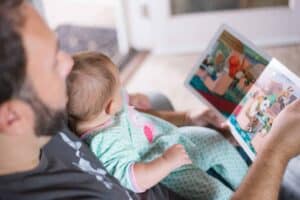 A man holding a baby