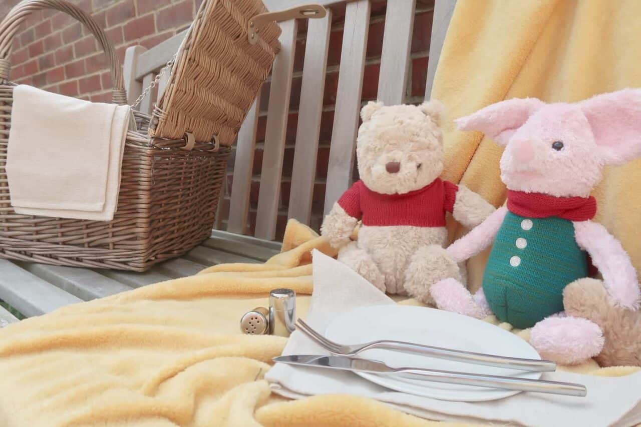 A group of stuffed animals sitting on top of a table