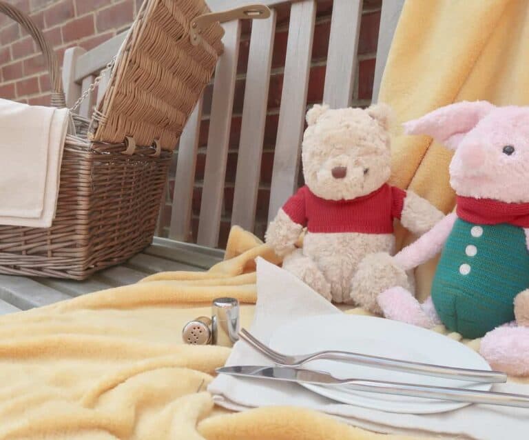 A group of stuffed animals sitting on top of a table