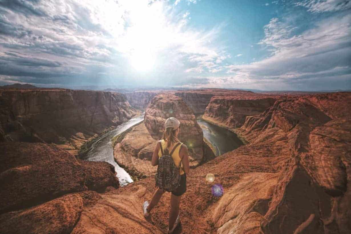 A canyon with a mountain in the background