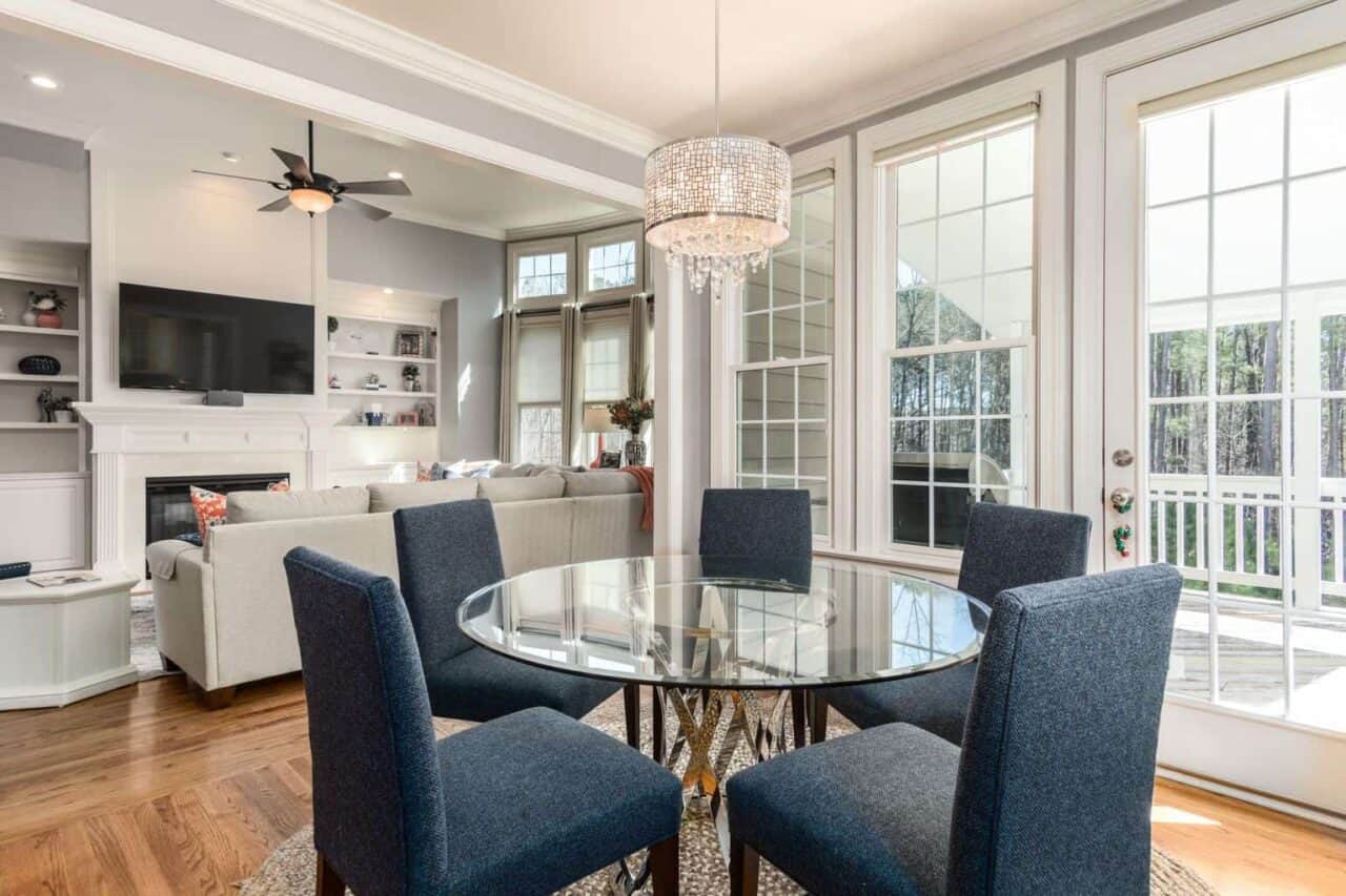 A living room filled with furniture and a large window