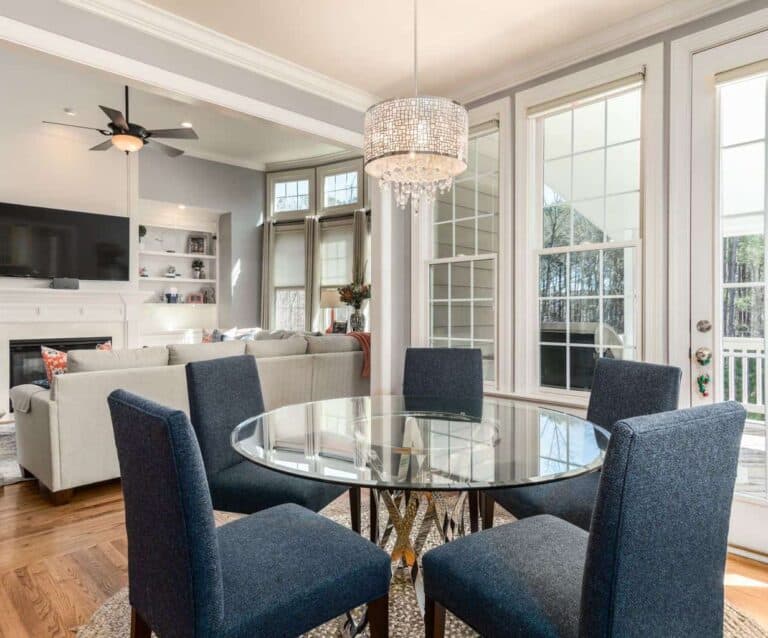 A living room filled with furniture and a large window