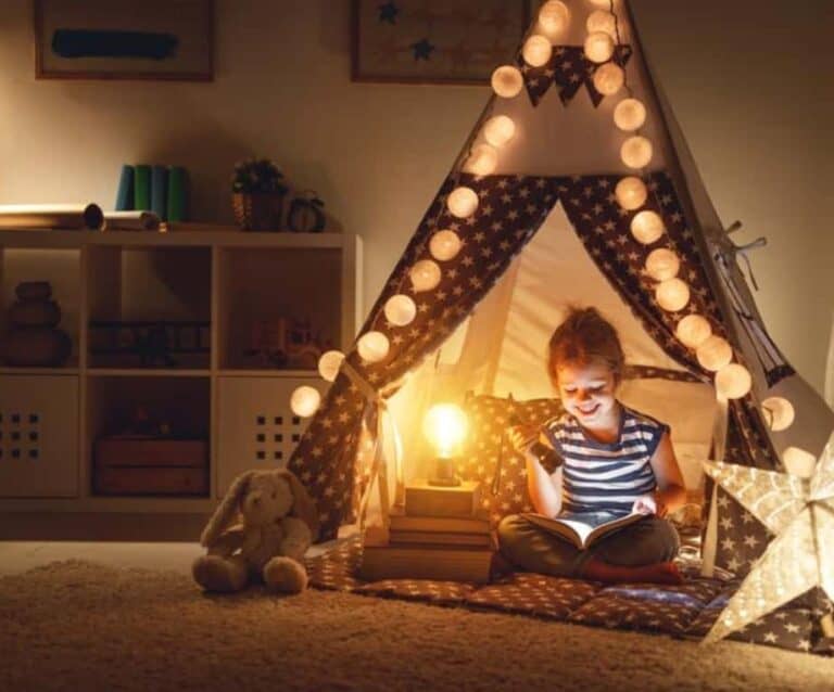 A girl sitting on a bed