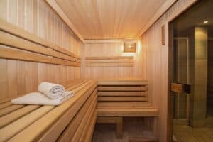 A bedroom with a wooden floor