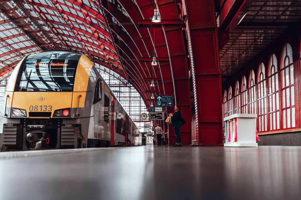 A train is parked on the side of a building