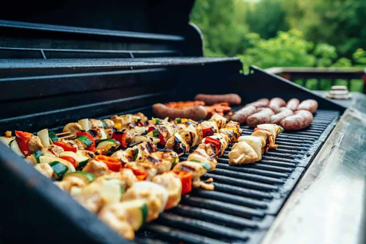 A pizza sitting on top of sushi on a grill