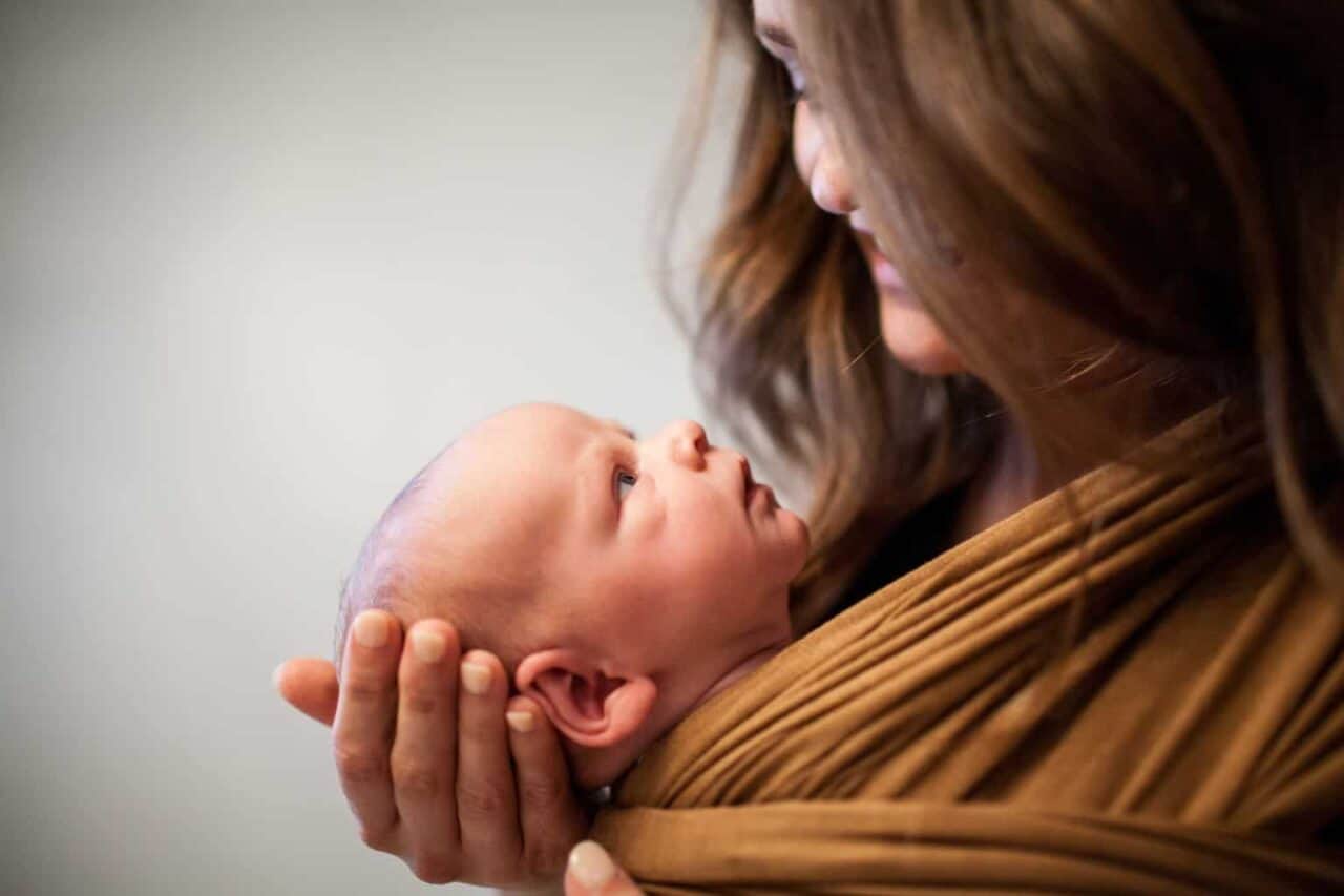 A person holding a baby