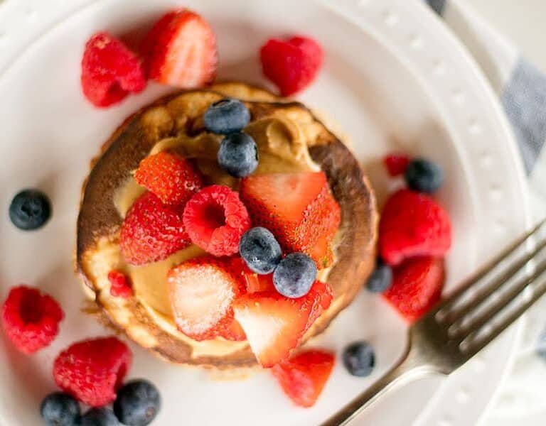 A close up of a slice of cake on a plate, with Pancake and Roo