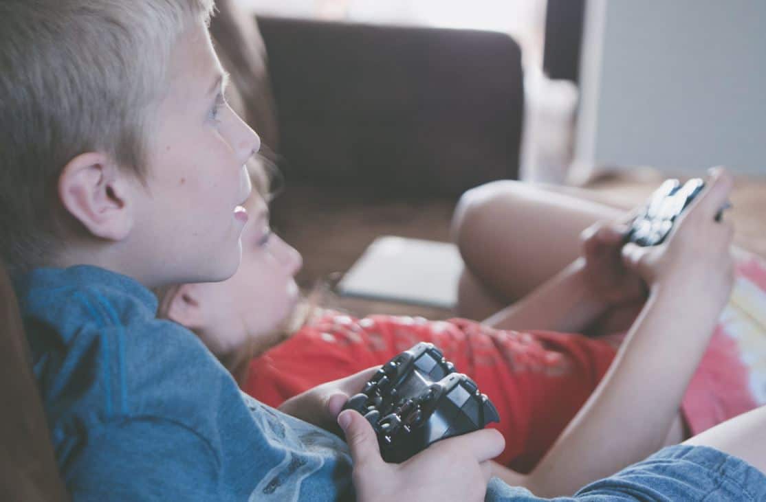 A young boy sitting on a couch