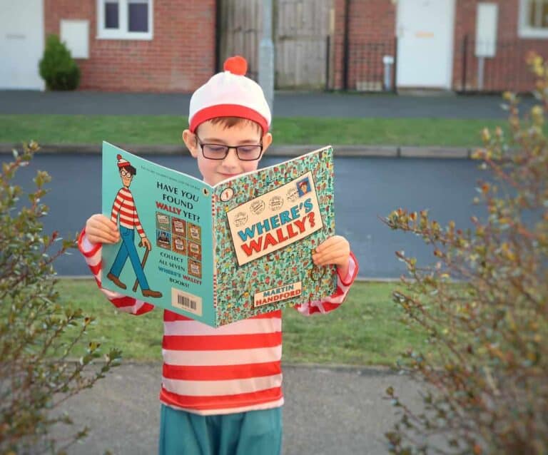 A little boy wearing a hat