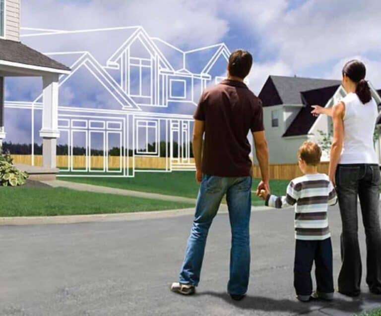A group of people standing in front of a building