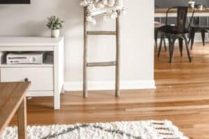 A dining room table in front of a wooden floor