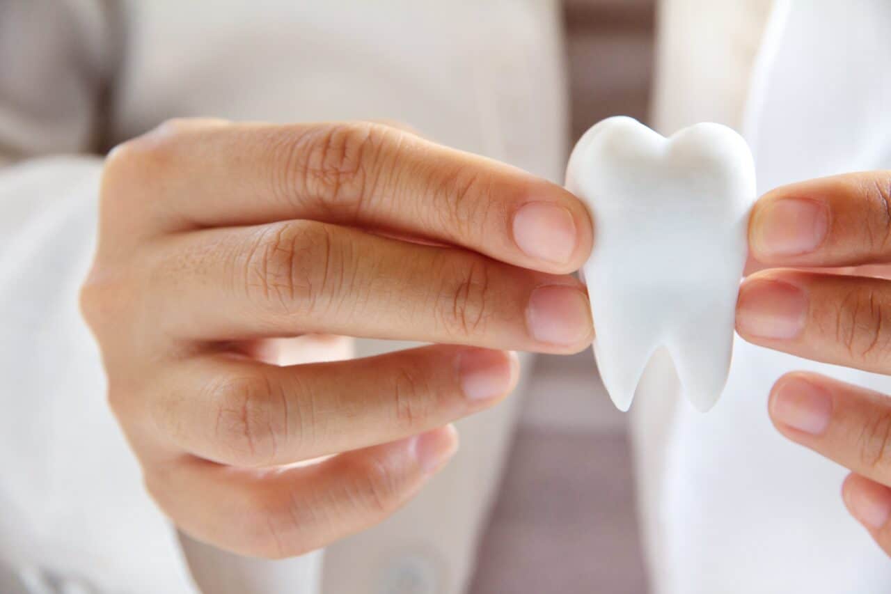 A cup, with Tooth and Dentist