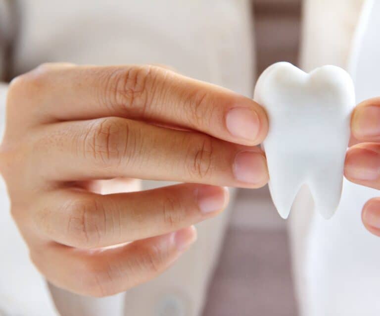 A cup, with Tooth and Dentist