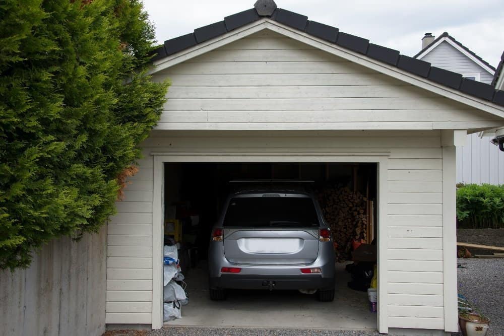 A car parked in front of a house