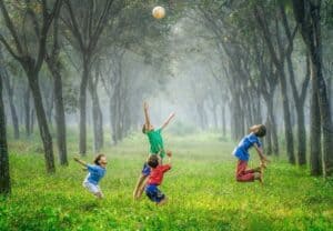 A little girl playing with a kite