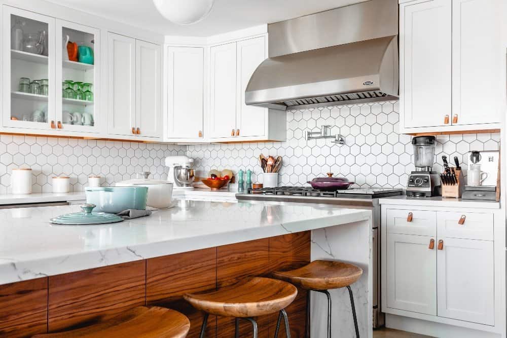 A kitchen with a sink and a microwave