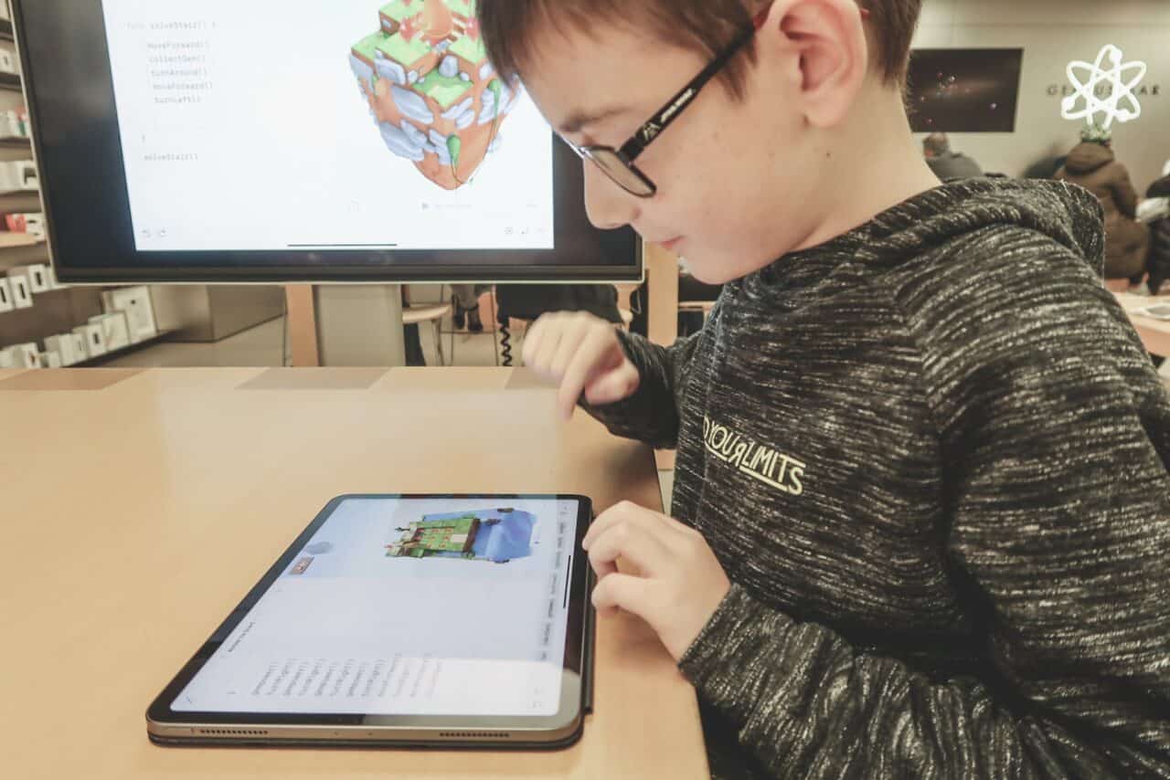 A person standing in front of a computer