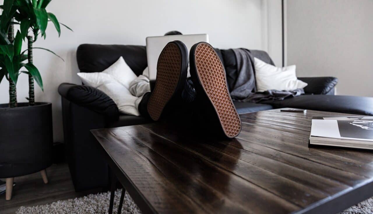 A living room with a couch and a table