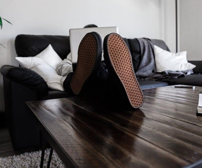 A living room with a couch and a table