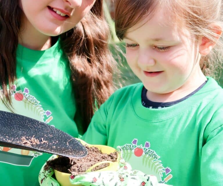 A little girl in a green shirt