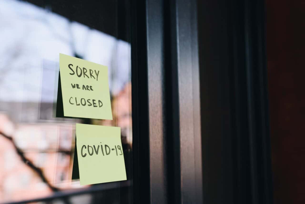 A close up of a sign saying sorry we are closed