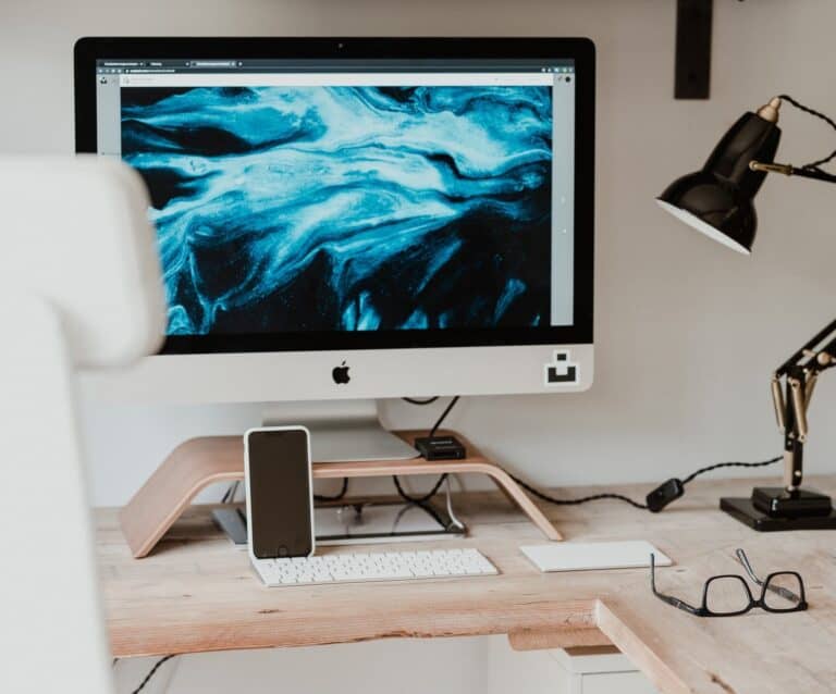 A desktop computer sitting on top of a table