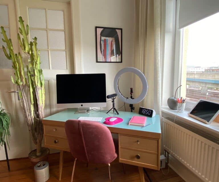 A living room filled with furniture and a large window