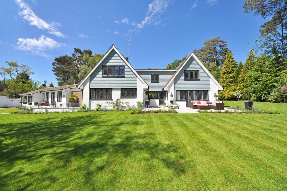 Landscaping project - house with green lawn