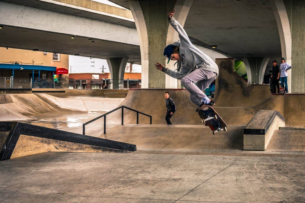 woman doing skateboard trick