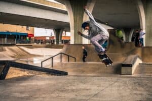 woman doing skateboard trick