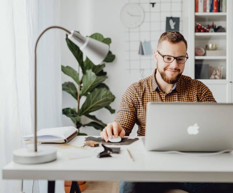man using macbook