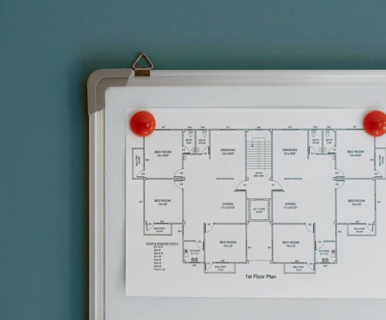 floor plan hanging on whiteboard