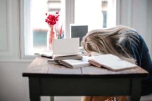 Effective Study Skills: Encouraging Good Teen Study Habits - woman leaning on table