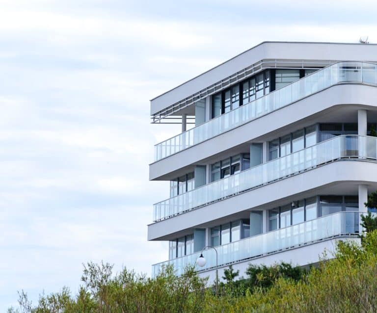 white and blue high rise building