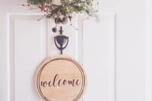 brown wooden welcome wall decor