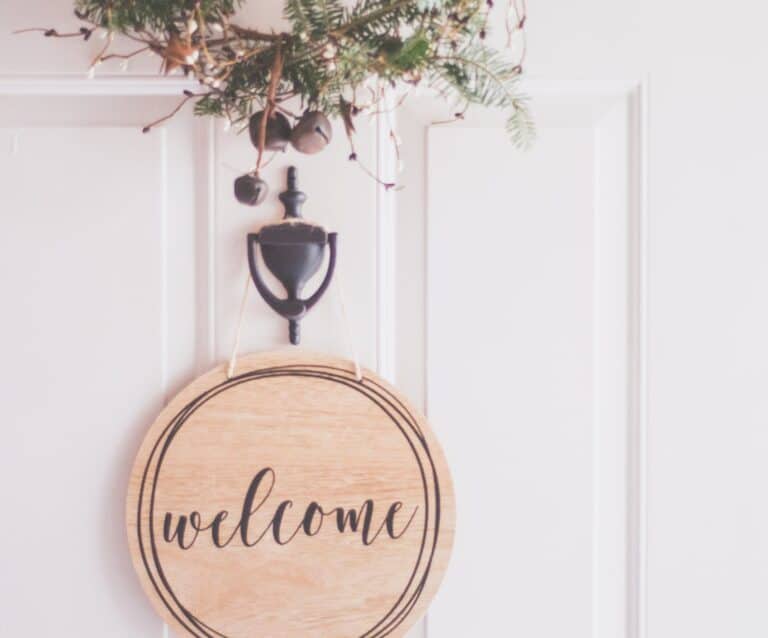 brown wooden welcome wall decor