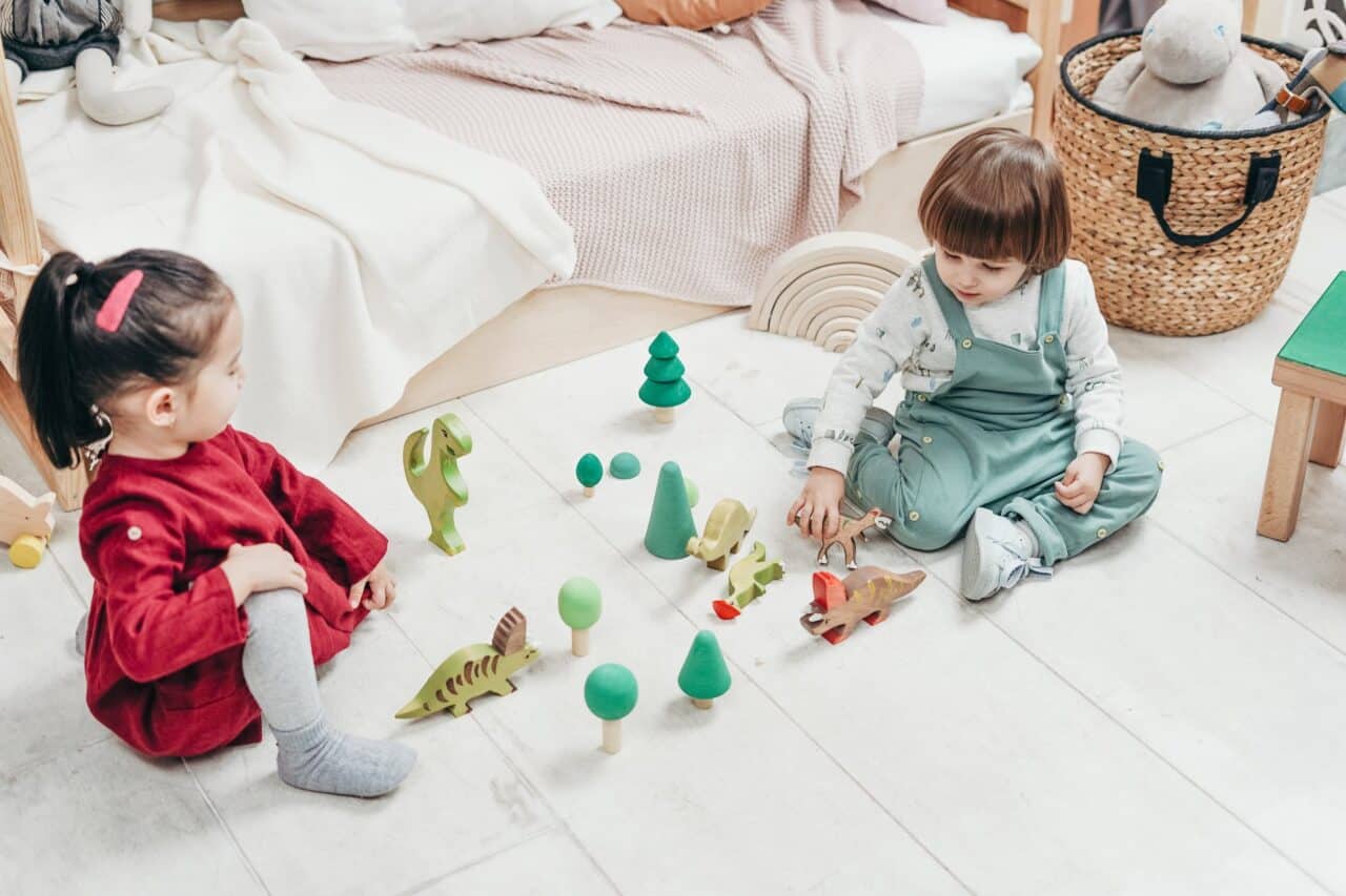 children playing wooden toys