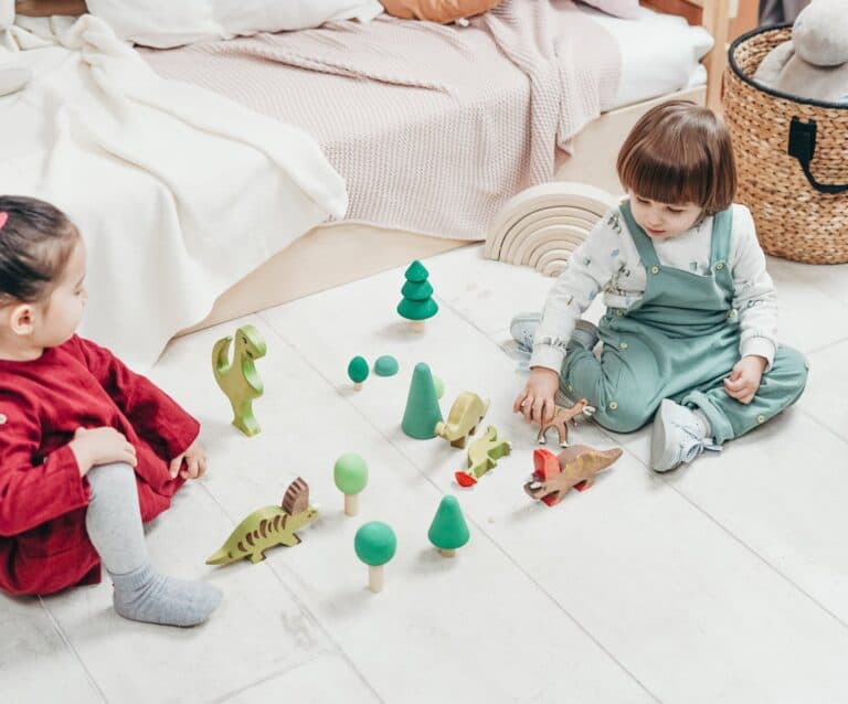 children playing wooden toys