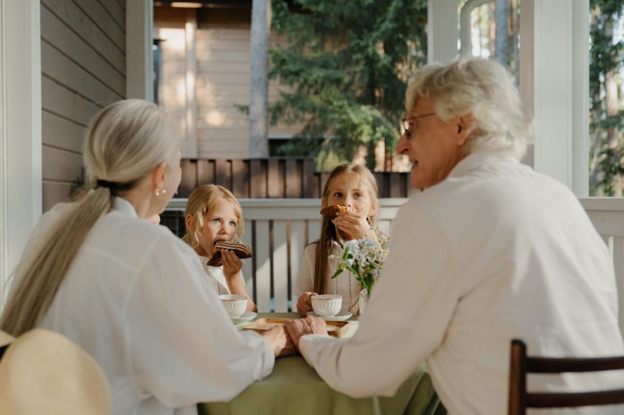 grandparents and kids sitting together