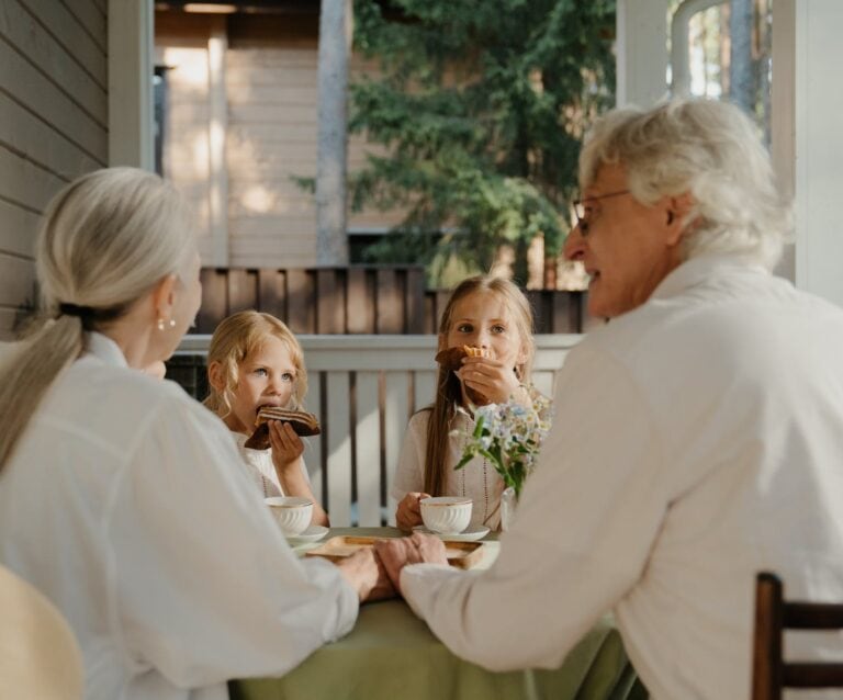 grandparents and kids sitting together