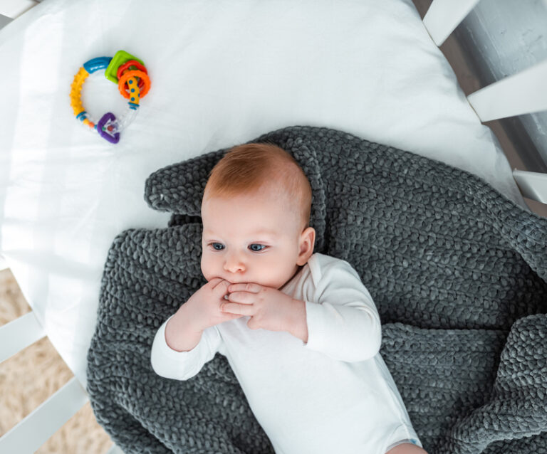 When Can a Baby Sleep with a Blanket?